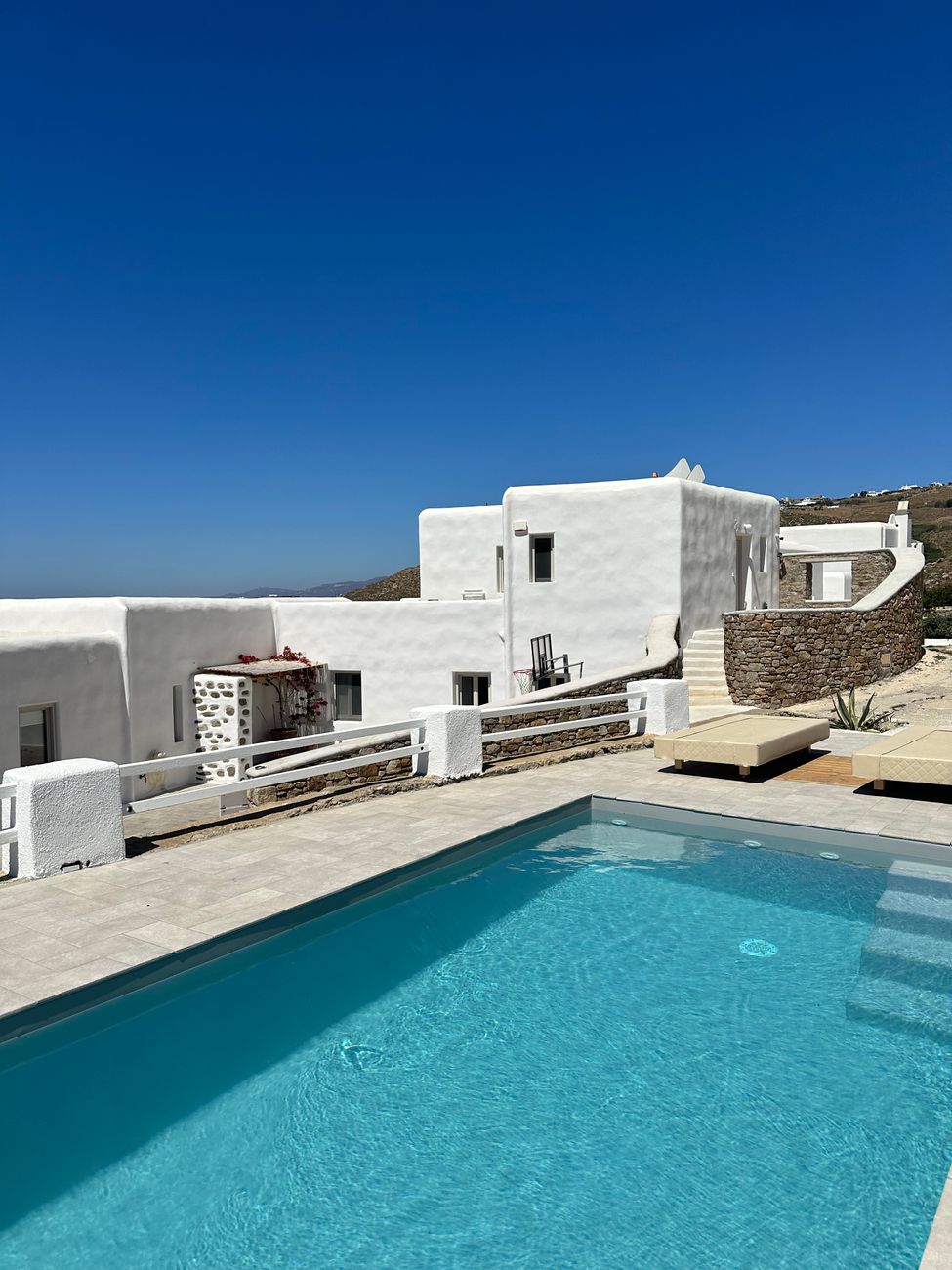 Premium private swimming pool with crystal clear water overlooking garden